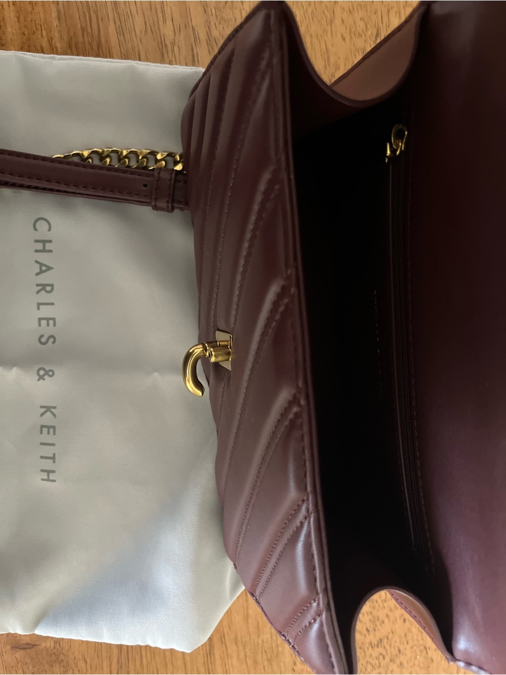Charles & Keith Quilted Crossbody Bag in Deep Burgundy with Gold Chain - Picture 2 of 3